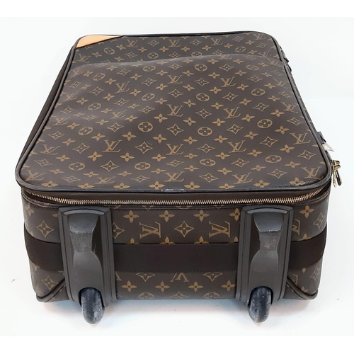 345 - Louis Vuitton Suitcase in famed LV monogrammed pattern.
Comes with Dust Cover, Lock & Key and a LV s... 