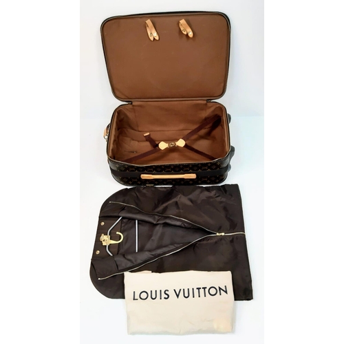 345 - Louis Vuitton Suitcase in famed LV monogrammed pattern.
Comes with Dust Cover, Lock & Key and a LV s... 