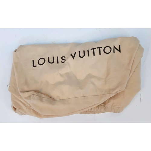 359 - Large Luis Vuitton Duffle Bag. 
Famed LV monogrammed canvass, double carry handles and attached shou... 