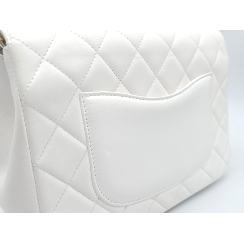 4 - Chanel Carry Chic Bag.
Lamskin throughout, front single flap is quilted with diamond stitching. Silv... 