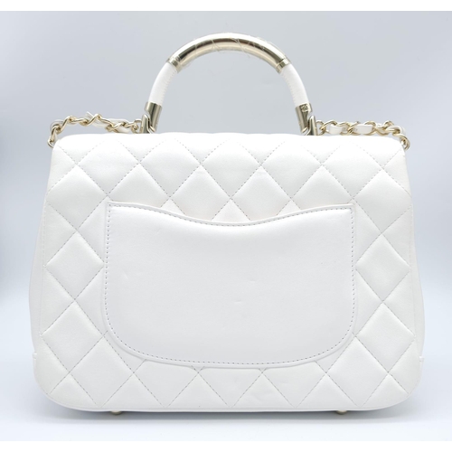 4 - Chanel Carry Chic Bag.
Lamskin throughout, front single flap is quilted with diamond stitching. Silv... 