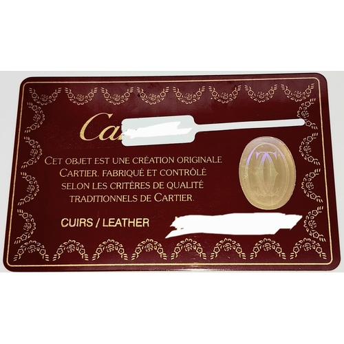 423 - Cartier Burgundy Leather Wallet.
Stylish gold toned hardware and famed CC embossed logo front. Sever... 