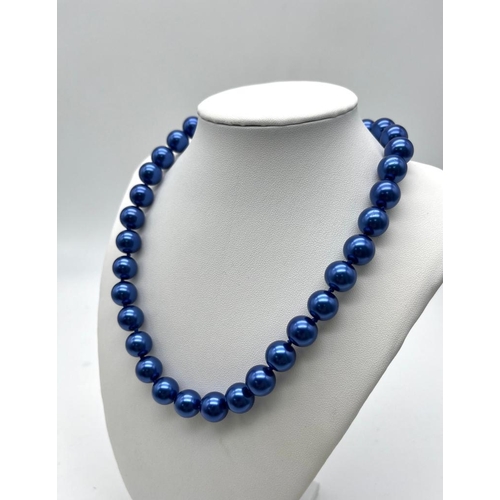 471 - A Metallic Electric Blue South Sea Pearl Shell Bead Necklace. 12mm beads. Heart clasp. 44cm necklace... 