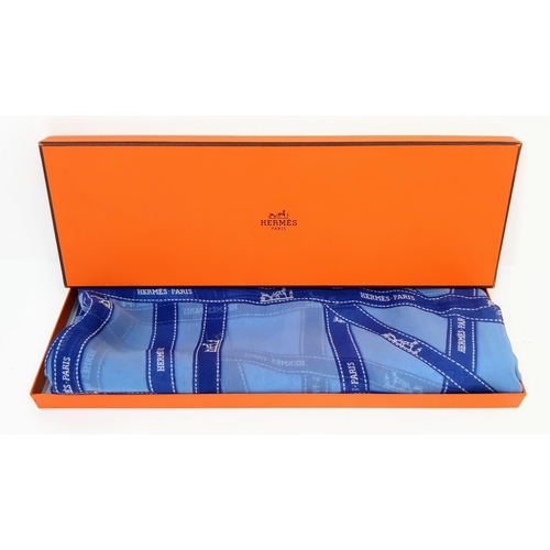 578 - Hermes Two Toned Blue Patterned Scarf.
100% Silk and made in France, this Hermes scarf comes boxed a... 