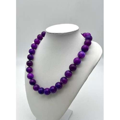 618 - An Enticing Winter Shades of Purple Sugilite Bead Necklace. 14mm of captivating sugilite beads. 42cm... 