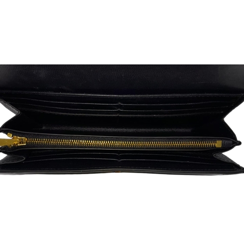 640 - Mulberry Darley Wallet.
Dark blue in colour with quality soft leather throughout. Gold tone hardware... 