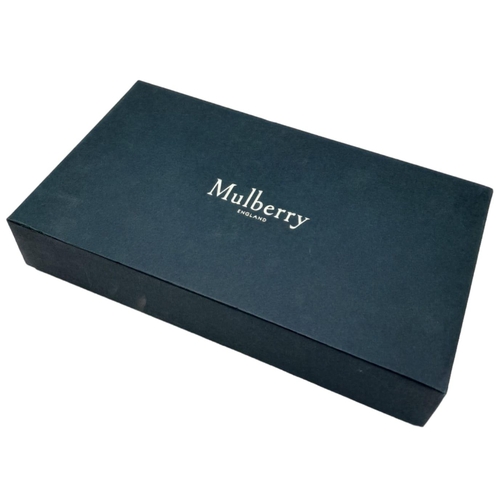 640 - Mulberry Darley Wallet.
Dark blue in colour with quality soft leather throughout. Gold tone hardware... 