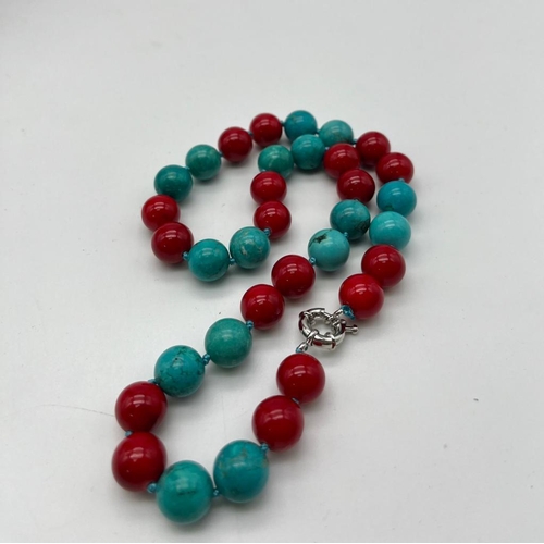 704 - A Gorgeous Turquoise and Red Coral Bead Necklace. 12mm beads. 44cm necklace length.