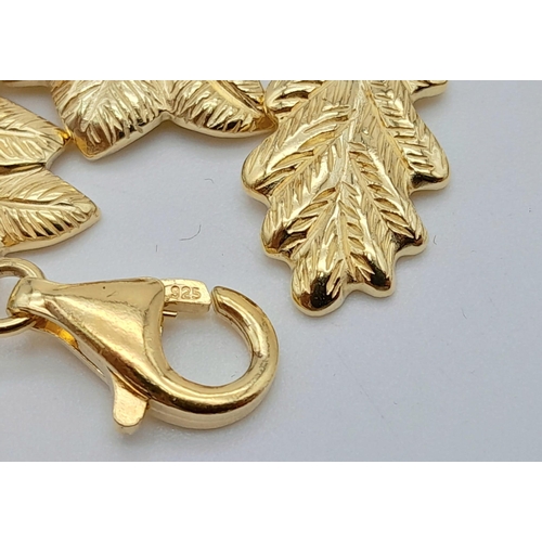 921 - A Yellow Gold Gilt Sterling Silver Leaf Design Bracelet. 
18cm Length. Gross Weight 21.74 Grams. 
In... 