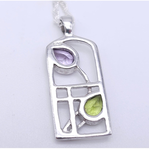 1143 - Sterling Silver, Rennie Mackintosh Design, Peridot and Amethyst Set Pendant
Necklace. 45cm Length St... 