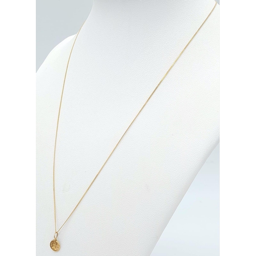 1404 - A SMALL 9K GOLD COIN ON A 40cms 9K GOLD CHAIN .   1.2gms