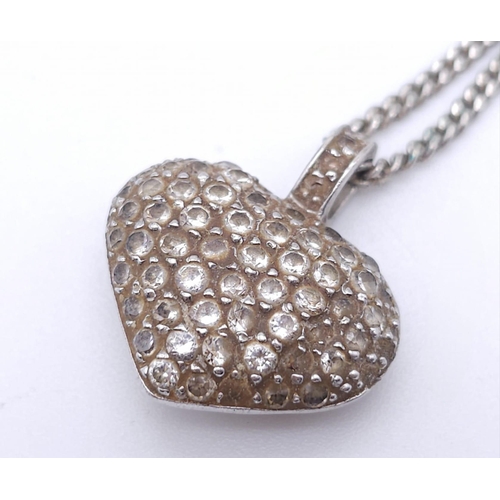 1480 - A 925 silver Filigree and stone set heart pendant on silver chain. Total weight 7G. Total length 46c... 