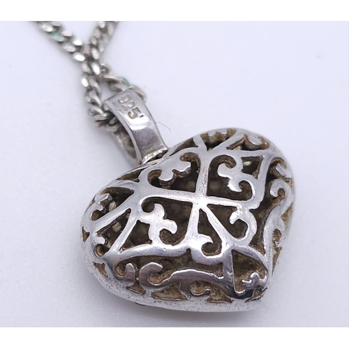 1480 - A 925 silver Filigree and stone set heart pendant on silver chain. Total weight 7G. Total length 46c... 