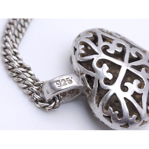 1480 - A 925 silver Filigree and stone set heart pendant on silver chain. Total weight 7G. Total length 46c... 