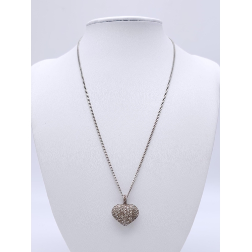 1480 - A 925 silver Filigree and stone set heart pendant on silver chain. Total weight 7G. Total length 46c... 