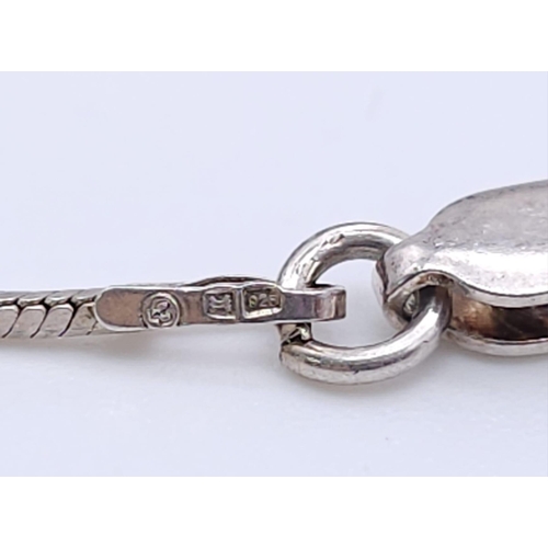 1494 - A 925 silver drop pendant on silver chain. Total weight 4.66G. Total length 46cm.