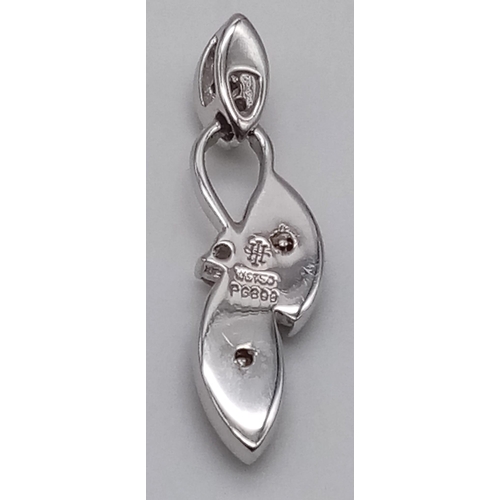 304 - A 18K WHITE GOLD DIAMOND AND STONE DROP PENDANT 1.7G 26mm
ref: SC 5047