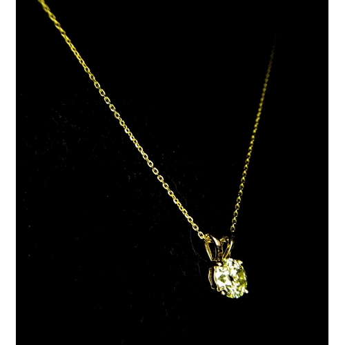 464 - An 18k Yellow Gold Diamond Solitaire Pendant on a gold plated silver chain. Round brilliant cut diam... 