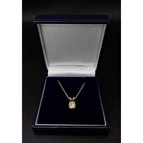 464 - An 18k Yellow Gold Diamond Solitaire Pendant on a gold plated silver chain. Round brilliant cut diam... 