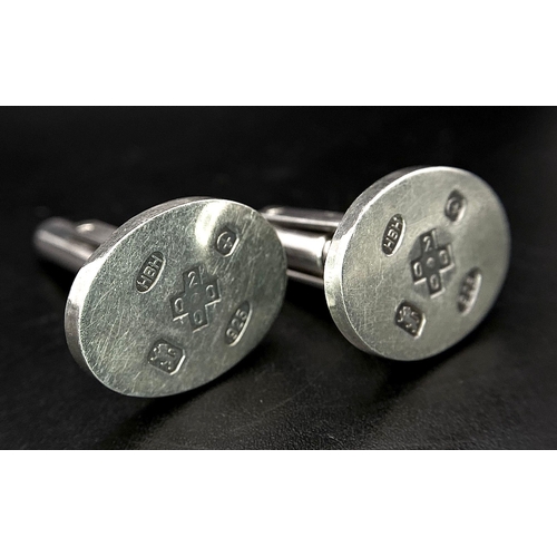 1162 - A pair of 9CT gold and silver cufflinks & A pair of sterling silver cufflinks with full Birmingham h... 