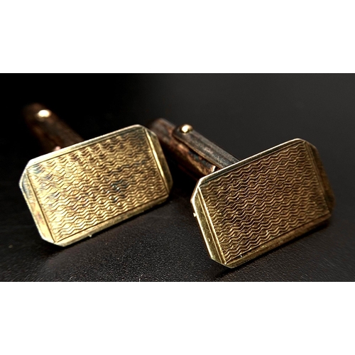 1162 - A pair of 9CT gold and silver cufflinks & A pair of sterling silver cufflinks with full Birmingham h... 