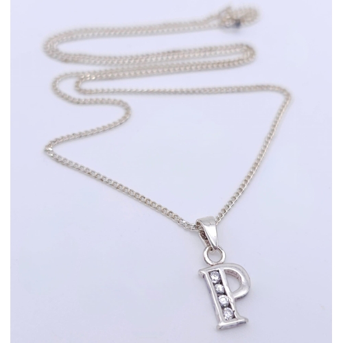 1256 - An Unworn, Ex Display, Sterling Silver, Stone Set, Letter ‘P’ Pendant Necklace. 
46cm Length Chain. ... 