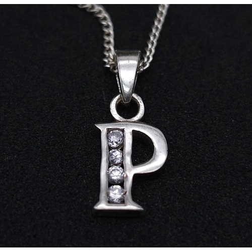 1256 - An Unworn, Ex Display, Sterling Silver, Stone Set, Letter ‘P’ Pendant Necklace. 
46cm Length Chain. ... 