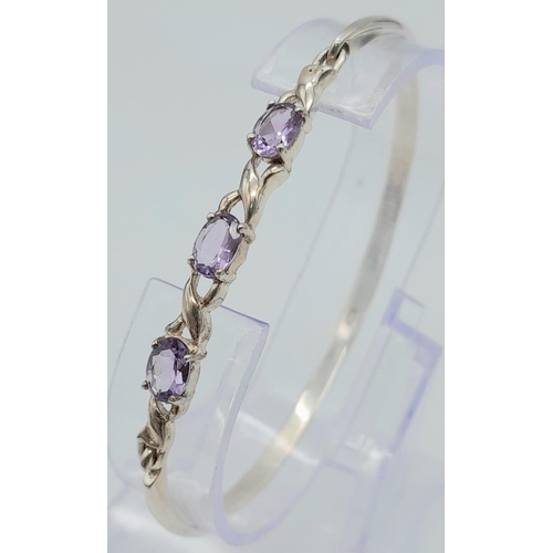 949 - Sterling Silver, Three Amethyst Set, Hook Link Bracelet. 6.7cm Inner Width, Set with 7mm Long Oval C... 