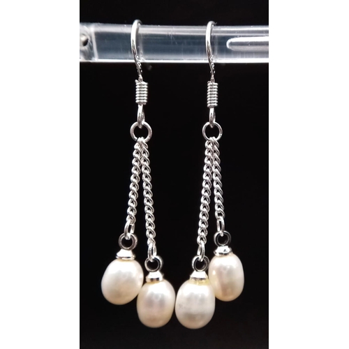 951 - Three Pairs of Freshwater Pearl and 925 Silver Drop Earrings. White, lavender and peach shades. Drop... 