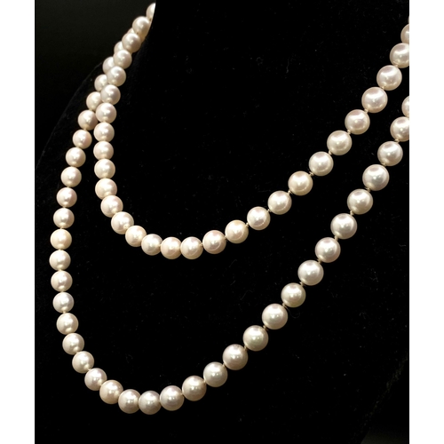 967 - A Cultured Pearl Matinee Length Necklace -78cm. No clasp. 
6/7mm pearls. Ref: 14845