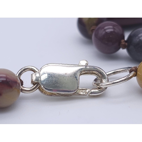 1195 - An Ex Display, Sterling Silver, Red Jasper & Mookaite Necklace. 
90cm Length. In its presentation bo... 