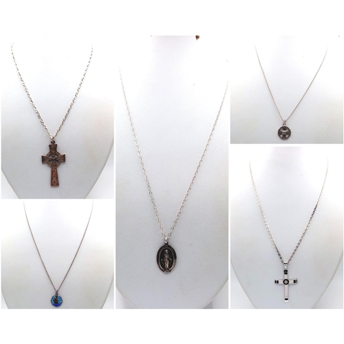 1593 - Collection of 5 various Sterling Silver Necklaces.
All religious style pendants, various lengths ran... 