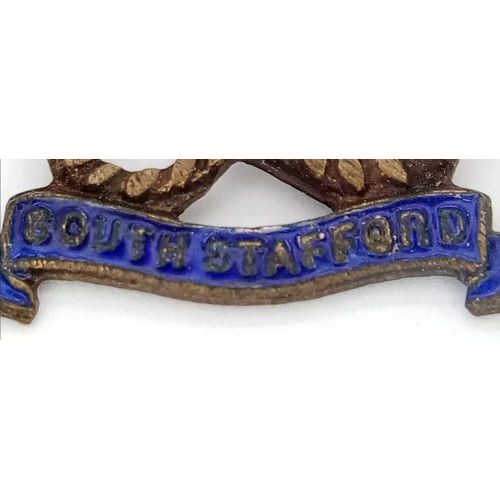 1033 - WW1 Crossed Rifles Sweetheart Brooch for the North Staffordshire Regiment. On original backing card.