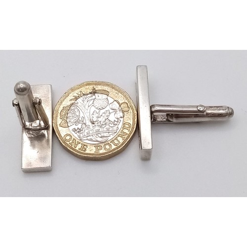 1094 - A PAIR OF SILVER INGOT CUFFLINKS .    16.7gms