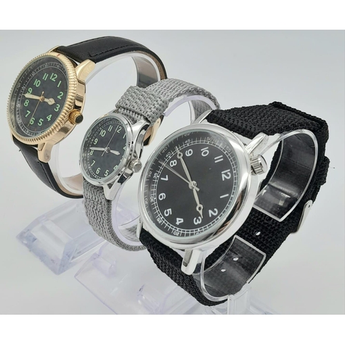 968 - A Parcel of Three Unworn Military Homage Watches. 
1) Gold Tone 1940’s German Sailor (43mm)
2) 1930’... 