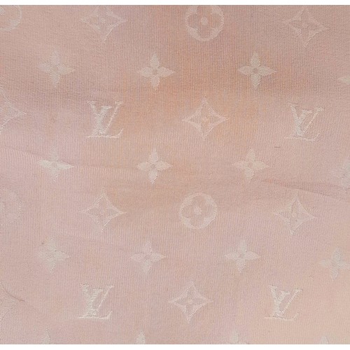 647 - A Louis Vuitton Pink Monogram Silk Scarf. Approximately 89cm x 89cm. Please see photos for condition... 