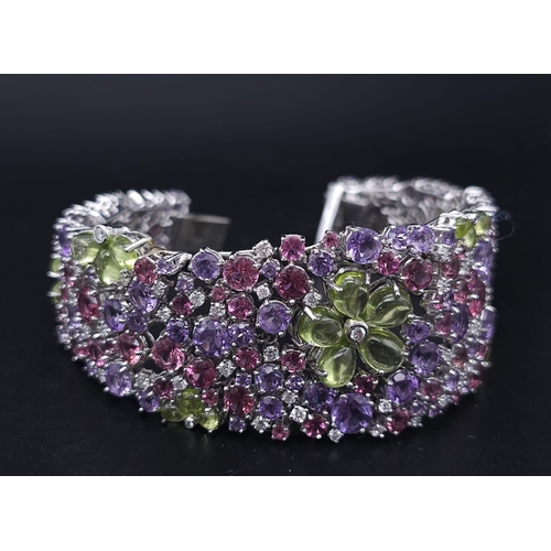 934 - A STUNNING DIAMOND AND MULTI GEMSTONE BRACELET SET IN 18K WHITE GOLD  .APPROX 17cms    52gms   01116... 