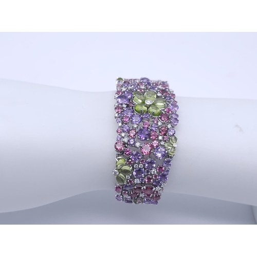 934 - A STUNNING DIAMOND AND MULTI GEMSTONE BRACELET SET IN 18K WHITE GOLD  .APPROX 17cms    52gms   01116... 