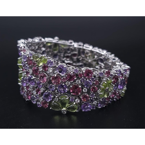 934 - A STUNNING DIAMOND AND MULTI GEMSTONE BRACELET SET IN 18K WHITE GOLD  .APPROX 17cms    52gms   01116... 