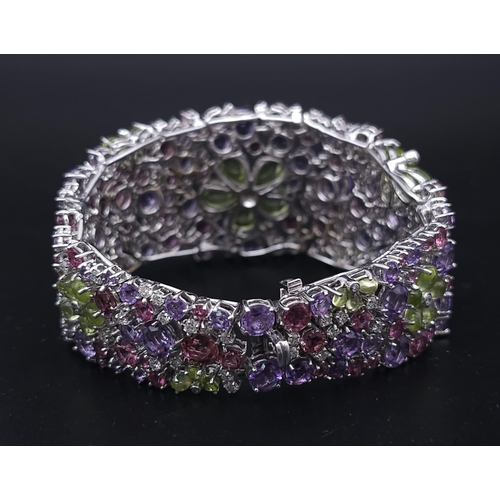 934 - A STUNNING DIAMOND AND MULTI GEMSTONE BRACELET SET IN 18K WHITE GOLD  .APPROX 17cms    52gms   01116... 