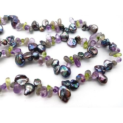 1202 - An Ex Display, Sterling Silver, Amethyst and Baroque Pearl Necklace. 
50cm Length. Boxed.