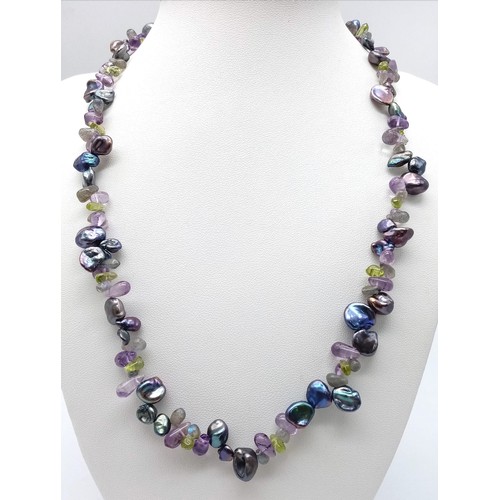 1202 - An Ex Display, Sterling Silver, Amethyst and Baroque Pearl Necklace. 
50cm Length. Boxed.