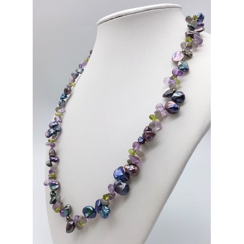 1202 - An Ex Display, Sterling Silver, Amethyst and Baroque Pearl Necklace. 
50cm Length. Boxed.