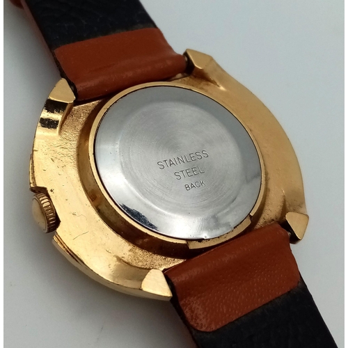 1441 - A Vintage Timex Blue Face Mechanical Watch. Brown leather strap. Gold plated oval case - 39mm. Mecha... 