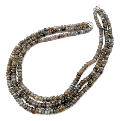 1455 - A beautiful three row necklace with labradorite (variety blue flash) faceted beads from Madagascar. ... 