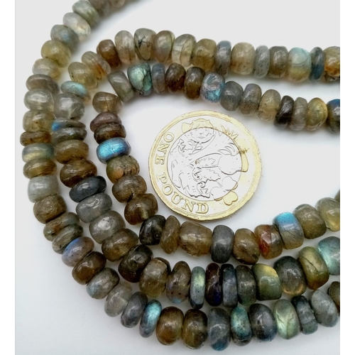 1455 - A beautiful three row necklace with labradorite (variety blue flash) faceted beads from Madagascar. ... 