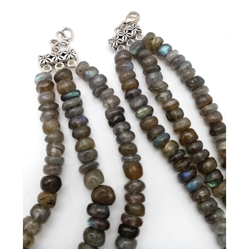 1455 - A beautiful three row necklace with labradorite (variety blue flash) faceted beads from Madagascar. ... 