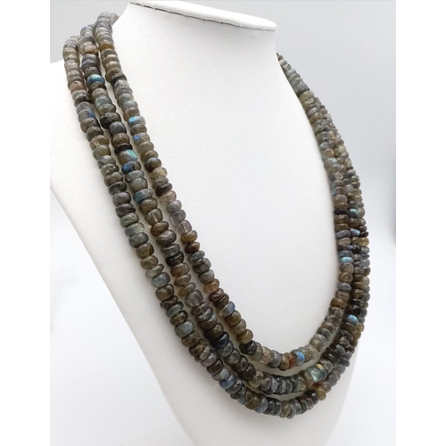 1455 - A beautiful three row necklace with labradorite (variety blue flash) faceted beads from Madagascar. ... 