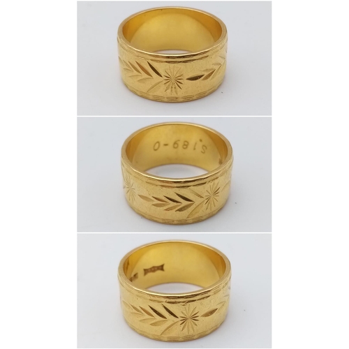 1392 - A Rich 22k Yellow Gold Band Ring with Arrowhead and Star Decoration. Size N. 10.7g weight.