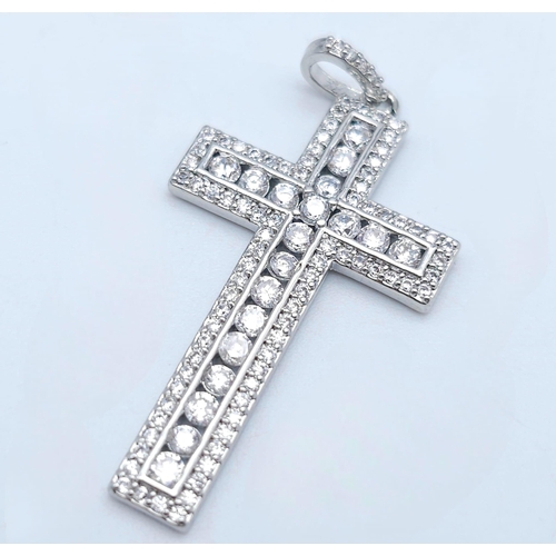 1525 - Two Bright Stone Zirconia Cross Pendants - Blue and White Stones. Largest cross - 4cm x 2cm